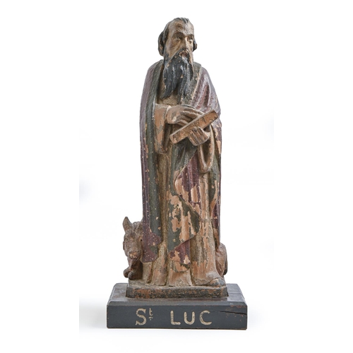 975 - A French polychrome statuette of St. Luke, 19th c, on associated painted base, 58cm h... 