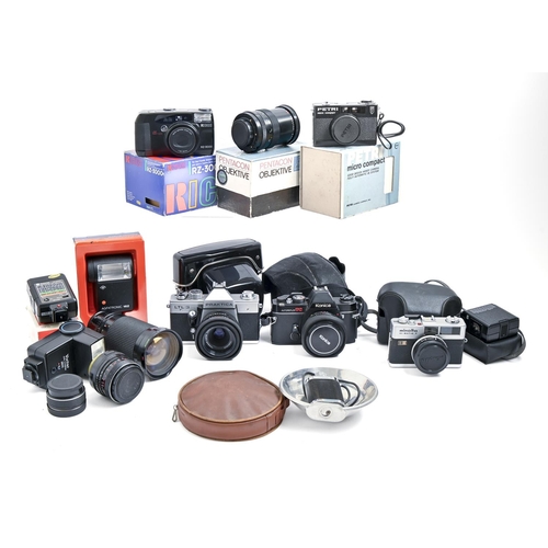 980 - Three Pentacon and other 35mm single lens reflex cameras, several lenses and accessories... 