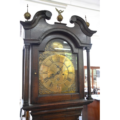 1246 - A George III eight day oak longcase clock, South Wales, M Thomas Carnarvon, with breakarched, engrav... 