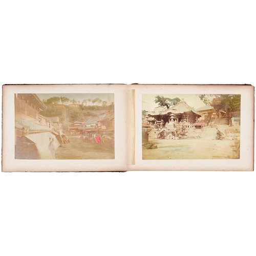 375 - Japan. A concertina album of 52 photographs, n.d., Meiji period c1870-1880, hand-coloured sepia phot... 