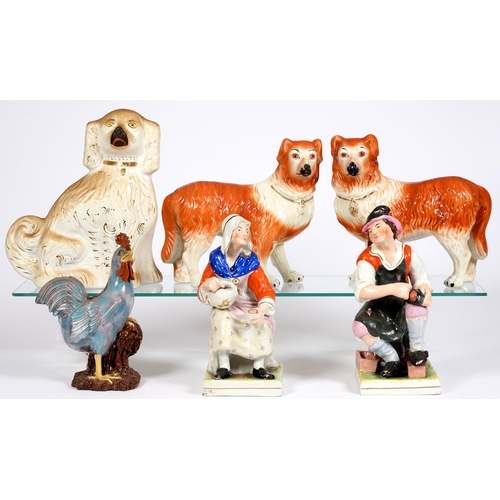 847 - A pair of Staffordshire figures of Jobson, the cobbler, and Nell, his wife, 19th c, decorated i... 