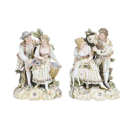 853 - A pair of Continental porcelain figural spills, 20th c, in the 18th c taste, as two women and their ... 