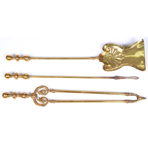 942 - A set of three Edwardian brass fire irons, poker 66cm l