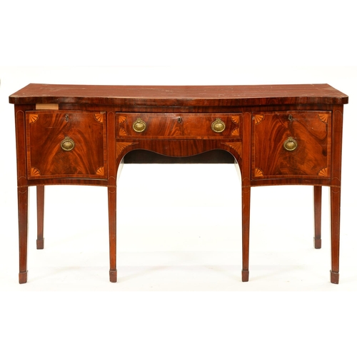 1186 - A George III   serpentine  mahogany and line inlaid sideboard, the front crossba... 