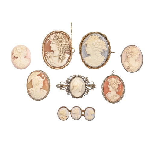 100 - An asymmetrical cameo brooch, the oval shell carved with the head of a bacchante, in beaded gold mou... 