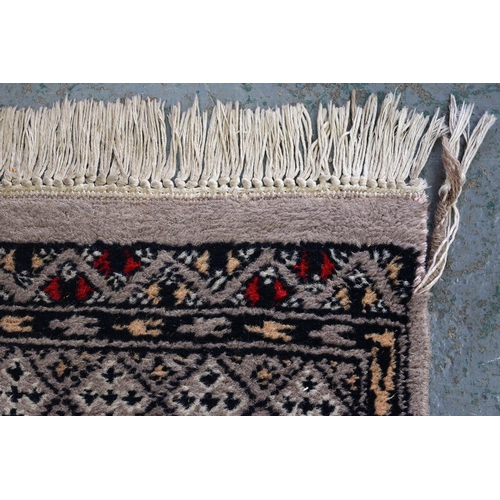 1144 - A Pakistan Bokhara runner, 81 x 448cm