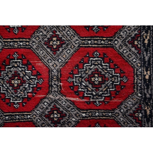 1144 - A Pakistan Bokhara runner, 81 x 448cm