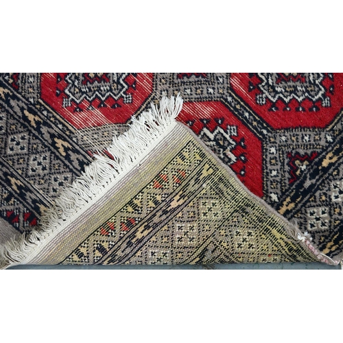 1144 - A Pakistan Bokhara runner, 81 x 448cm