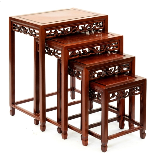 1201 - A set of South East Asian carved hardwood quartetto tables, 20th c, 66cm h; 35 x 51cm... 