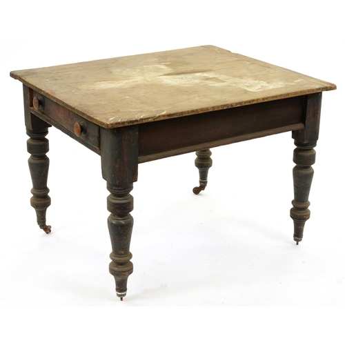 1214 - A Victorian painted pine kitchen table, the unpainted top cleated at one end and fitted with a drawe... 