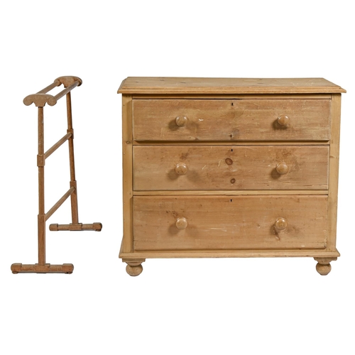 1217 - A waxed pine chest of drawers, 94cm h; 50 x 111cm and a turned wood towel rail (2)