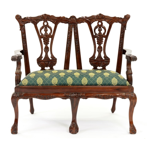 1224 - Miniature furniture. A carved and mahogany-stained twin chair back settee, in George II style, 57cm ... 