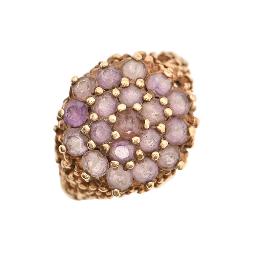 146 - An amethyst domed cluster ring, in 9ct gold, Birmingham 1974, 5.7g, size O½