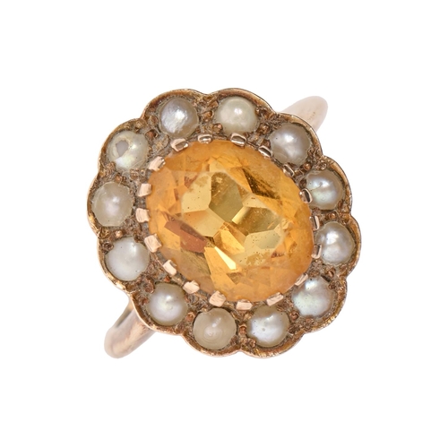 160 - An oval citrine and pearl cluster ring, 20th c, in Victorian style, in gold marked 9ct, 3.4g... 