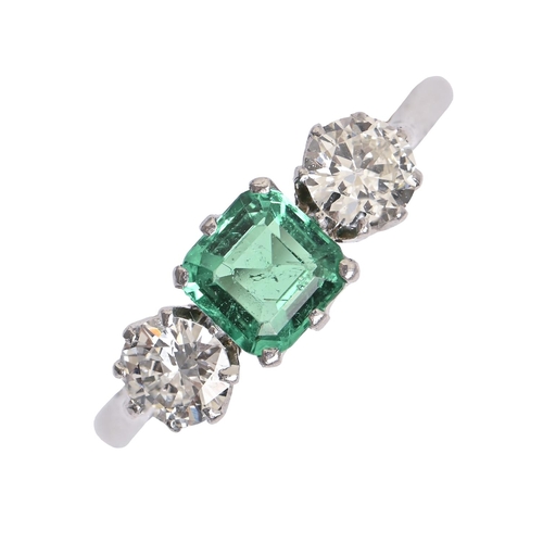 190 - An emerald and diamond ring, the step cut emerald (5 x 5mm) flanked by diamonds, in platinum marked ... 