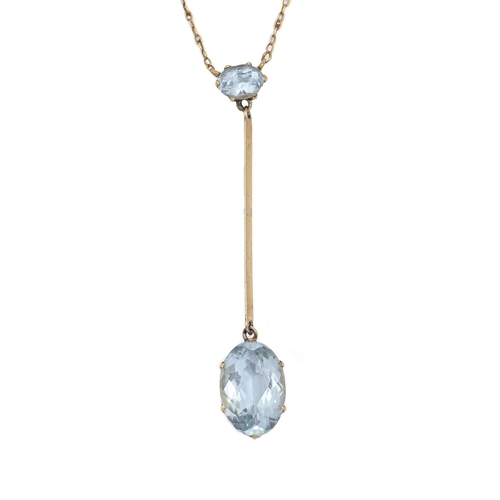 198 - An aquamarine pendant, early 20th c, in gold with knife wire, fully articulated, on integral gold ne... 