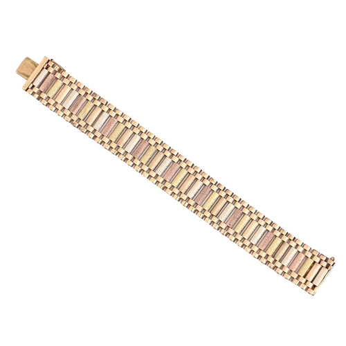 204 - A 9ct three colour gold bracelet, 18cm, Birmingham 1990, 34.9g