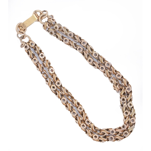 25 - A gold bracelet, adapted from a longer chain, 18cm l, with associated South East Asian gold clasp, 1... 