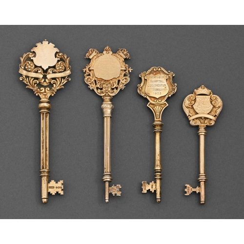 425 - Two Edwardian and two George V and Elizabeth II silver gilt ceremonial keys, all but one inscribed, ... 