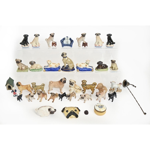 557 - Miscellaneous pottery, porcelain and other models of pug dogs and other ware in the form of, or deco... 