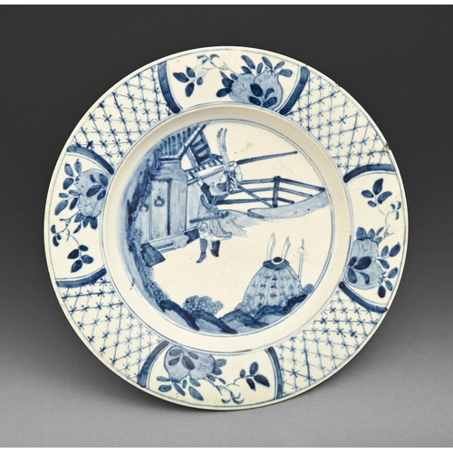 602 - A Bow blue and white plate, c1760, painted after a Chinse Kangxi original with a warrior, the diaper... 