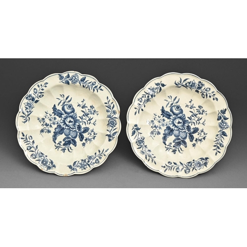 608 - A pair of Worcester fluted blue and white pates, c1785, transfer printed in underglaze blue with the... 