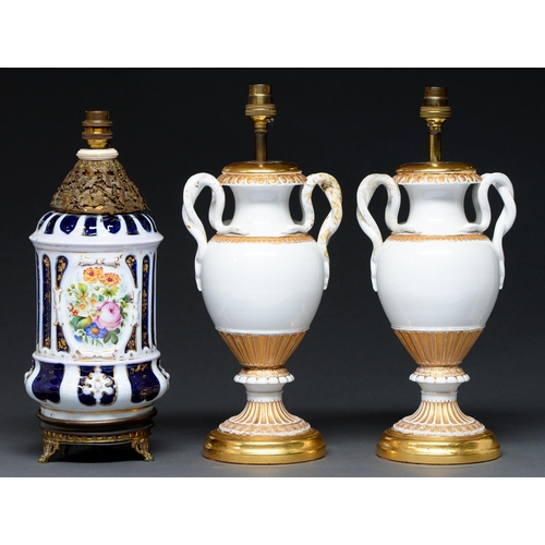 612 - A pair of giltwood mounted Meissen white and gilt snake handled vases, c1860, adapted as lamps, 30cm... 