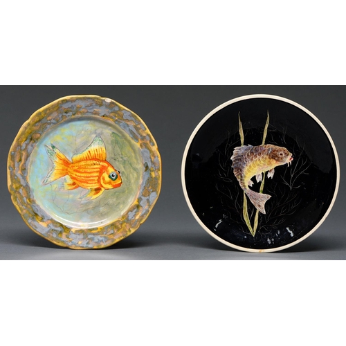 614 - Two Quimper faience plates, 20th c, painted by P Lamic or Guy Trevoux, both signed, with a fish, 21c... 