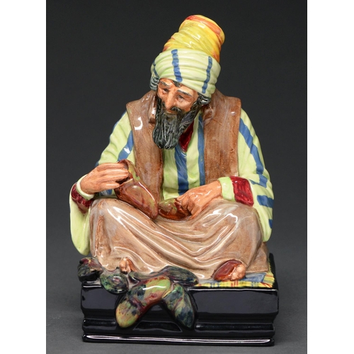 617 - A Royal Doulton earthenware figure of The Cobbler, 20cm h, printed mark, title and HN1706... 