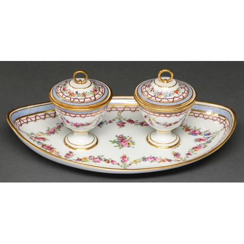 628 - A French porcelain inkstand, 19th c, of oval form with pair of shield shaped bowls, liners and cover... 