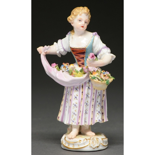 641 - A Meissen figure of a flower gatherer, early 20th c, in colours, 13.5cm h, impressed and incised num... 