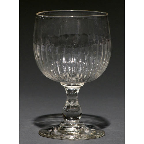 702 - A glass marriage goblet, early 19th c, the fluted ovoid bowl on baluster stem and spreading foot, 17... 