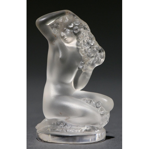 707 - A Lalique clear and frosted glass   figural paperweight, 84mm h, engraved Lalique France ®... 