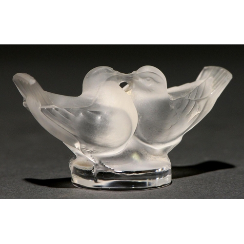 708 - Lovebirds. A Lalique frosted glass paperweight, late 20th c, 75mm l, engraved Lalique France... 