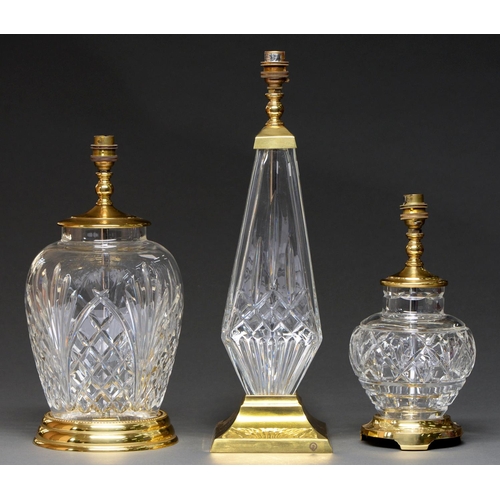 709 - Three Waterford cut glass table lamps, late 20th / early 21st c, brass mounted, including Lismore an... 