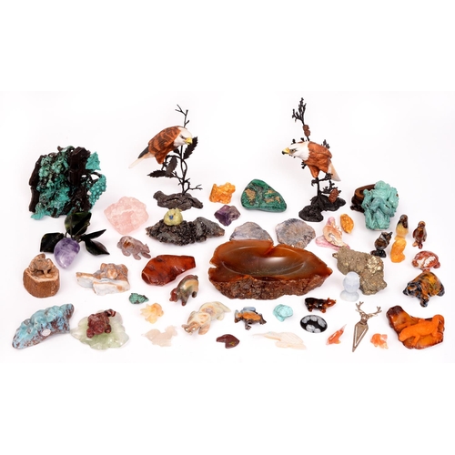 776 - A collection of miniature carved rock and mineral animal and cabinet ornaments, including malachite,... 