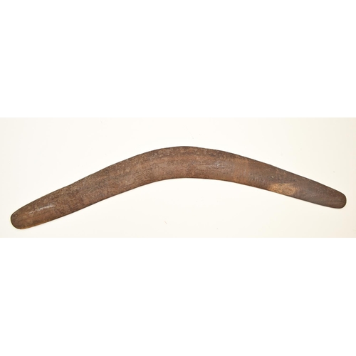 793 - An Australian aboriginal wood boomerang, first half 20th c, 67.5cm l