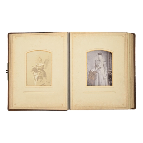 831 - Victorian photographs. An album of cabinet portraits and cartes de visite by various British photogr... 