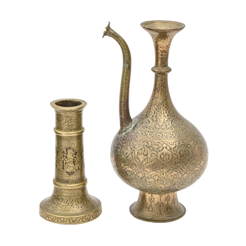 840 - A Syrian brass candlestick, early 20th c, chiselled with figures between bands of calligraphy, 20cm ... 