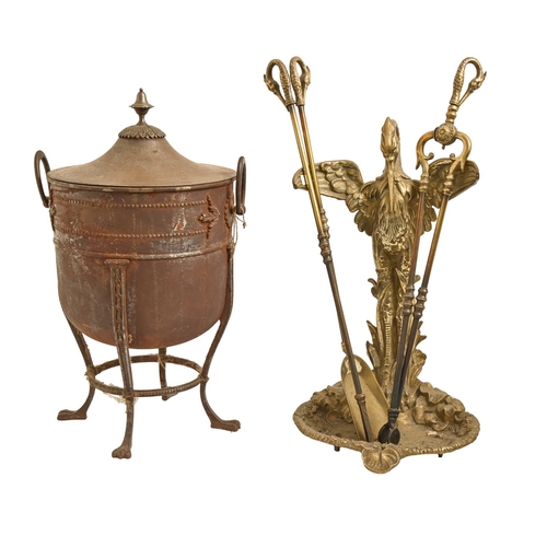 854 - A set of three brass swan handled fire irons, an ornate cast brass umbrella stand and a 1920s steel ... 