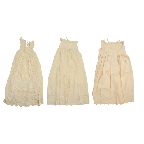 860 - A group of late Victorian and Edwardian christening gowns and baby's clothes and two contemporary ph... 