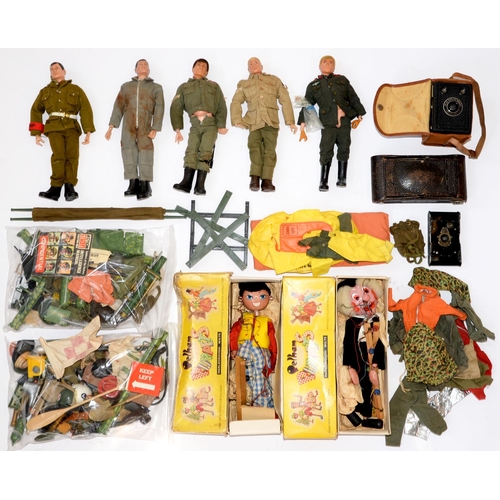 890 - A collection of action man dolls and accessories, two Pelham puppets, boxed, etc