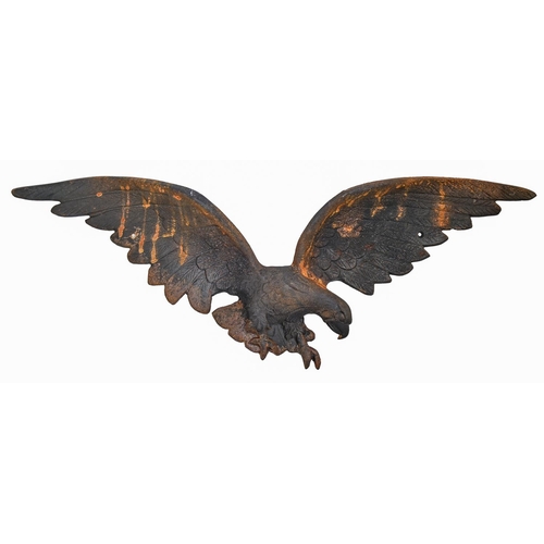 914 - A cast iron eagle applique, 20th c, 72cm l