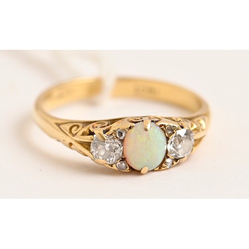 185 - An opal and diamond ring, early 20th c, in gold marked 18ct, 4.7g, size P