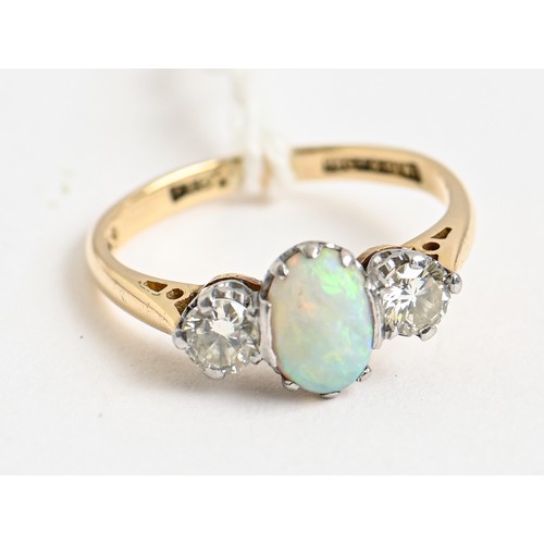 186 - An opal and diamond ring, gold hoop marked 18ct & PLAT, 3.7g, size O