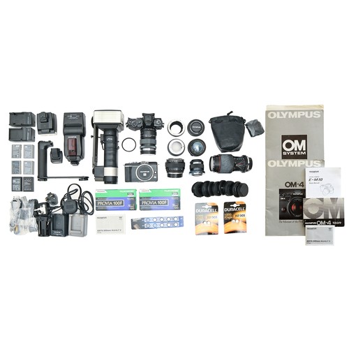 835 - An Olympus-D E-M10 camera and various Olympus and other camera lenses / guns and accessories... 