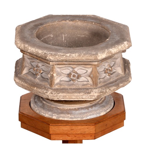 1218 - A Victorian gothic limestone font, the octagonal bowl carved with blind foliage on round foot, 17cm ... 