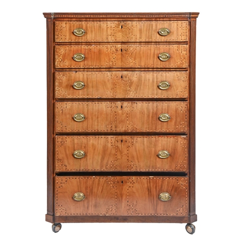 1204 - A Dutch walnut and inlaid chest of drawers, 19th c, with fluted angles and oval brass handles, 142cm... 