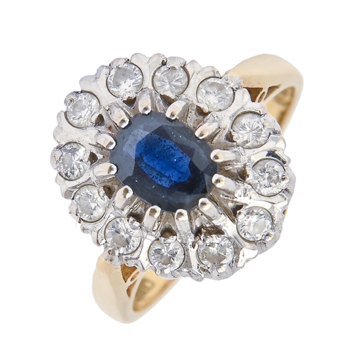 1 - A sapphire and diamond cluster ring, in 18ct gold, London 1976, 7.5g, size N