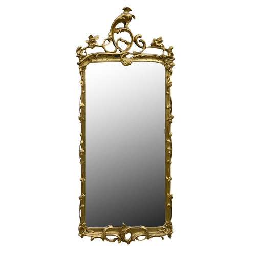 1124 - A giltwood mirror, early 20th c, in rococo style, 155 x 65cm